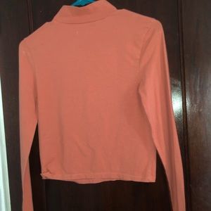 orange long sleeve turtle neck